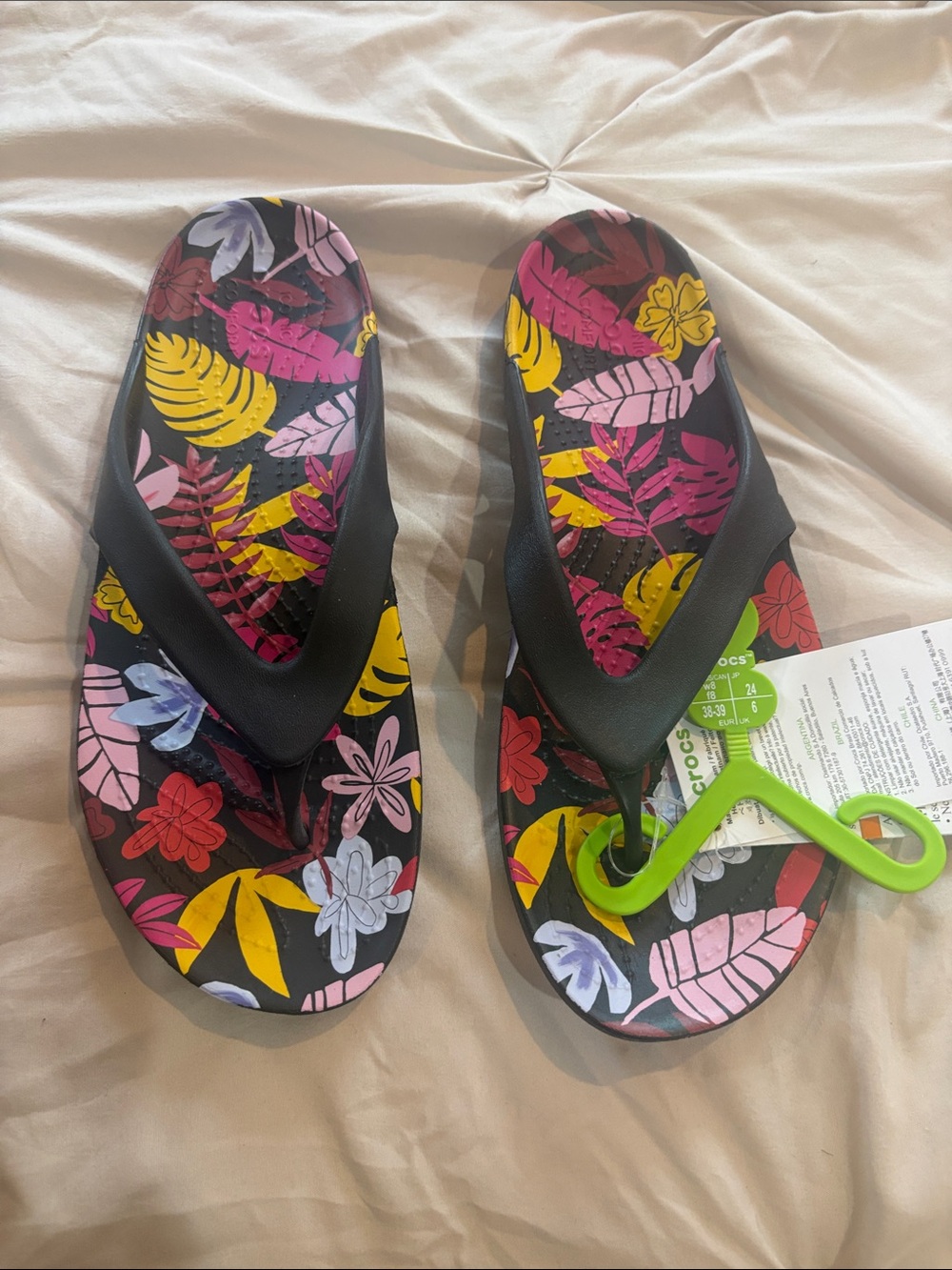 CROCS Women's Black Flip Sandals with Pink Yellow Purple Floral Print